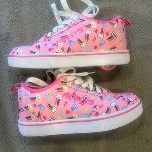 Little girls pink Heelys size 2.  Like new!!